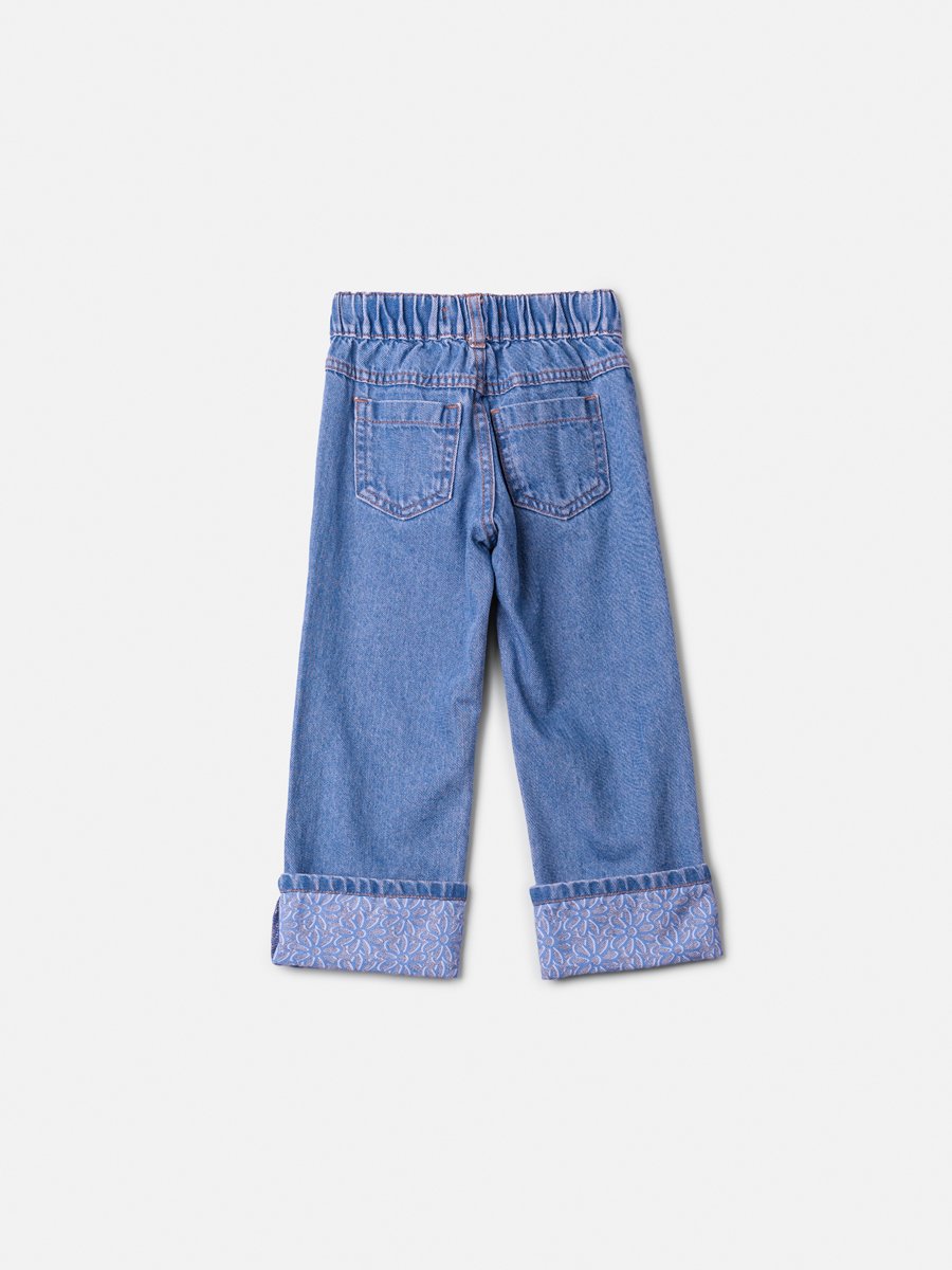 Jeans with Embroidery and Flower Pendant